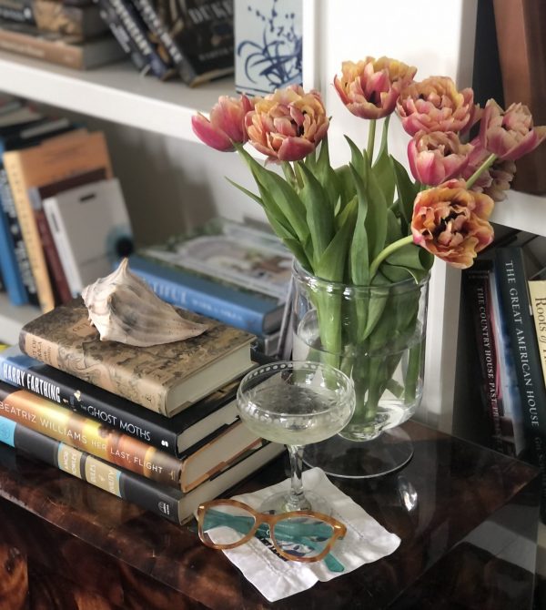 Image of books, flowers and all the good things you need for joyful living.